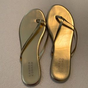 Simple gold flip flops